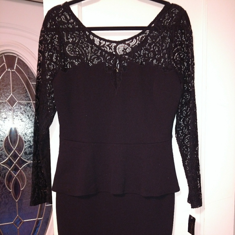 SOLD NWT black peplum dress size medium